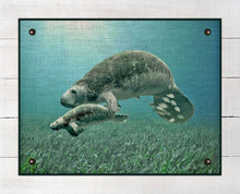 Load image into Gallery viewer, Manatee And Baby - Board Mounted Canvas Print
